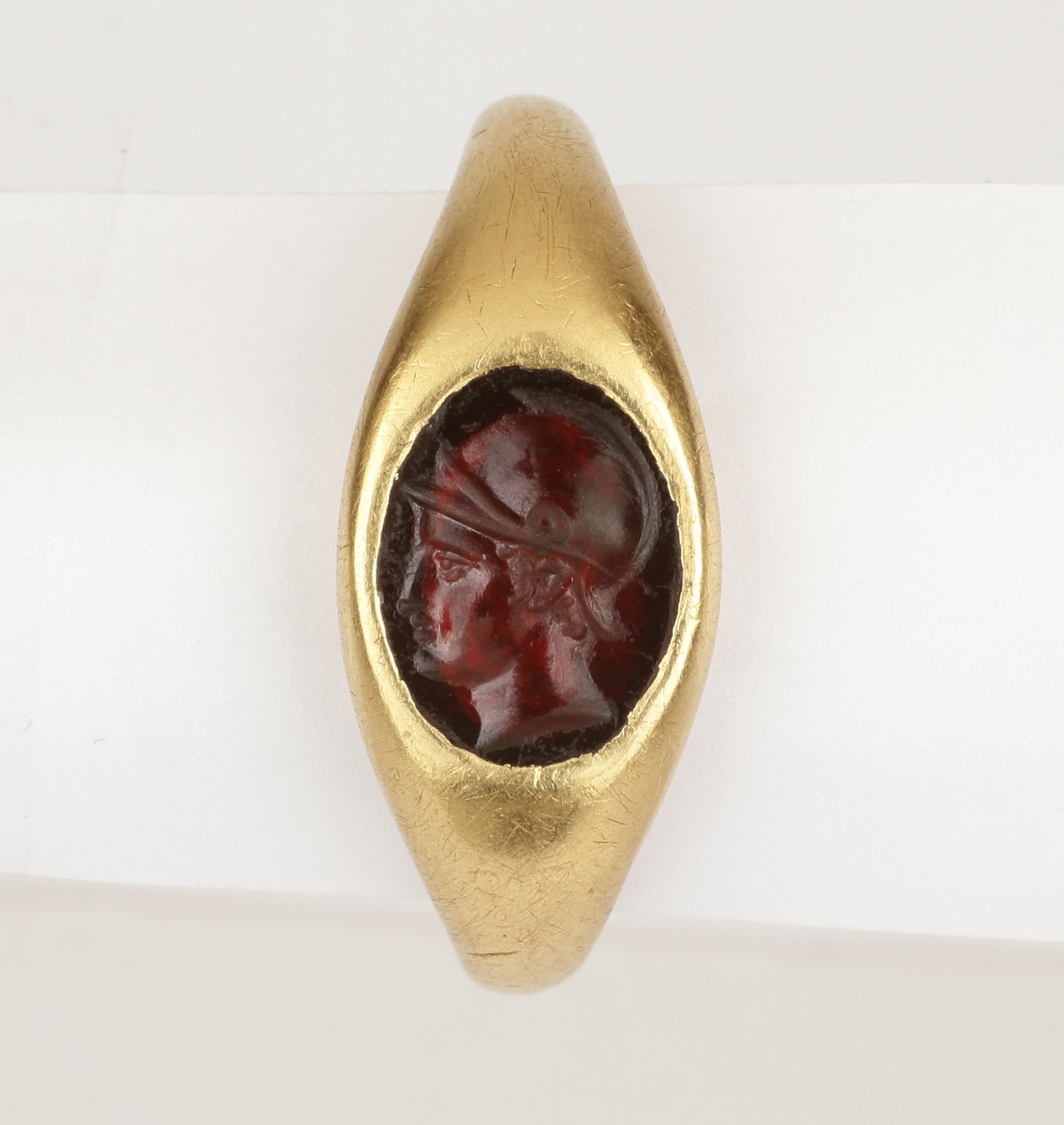 A Roman Gold Set Ring with Garnet Intaglio of Minerva